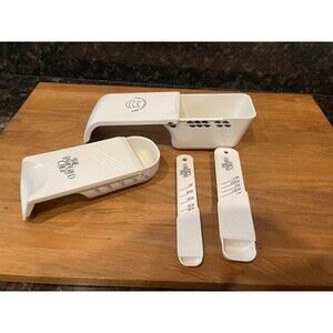 4 Pampered Chef Adjustable Slide Measuring Cups